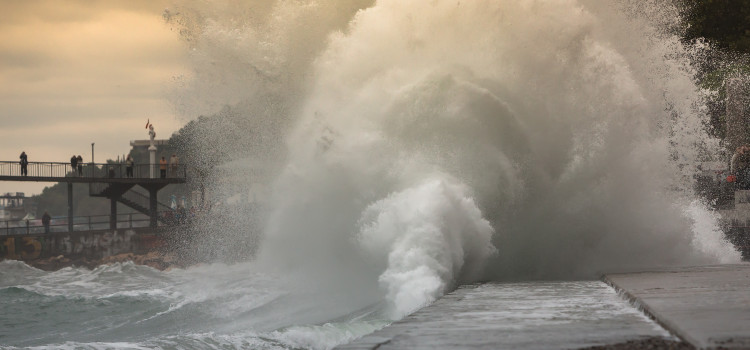 waves crashin ashore during a storm